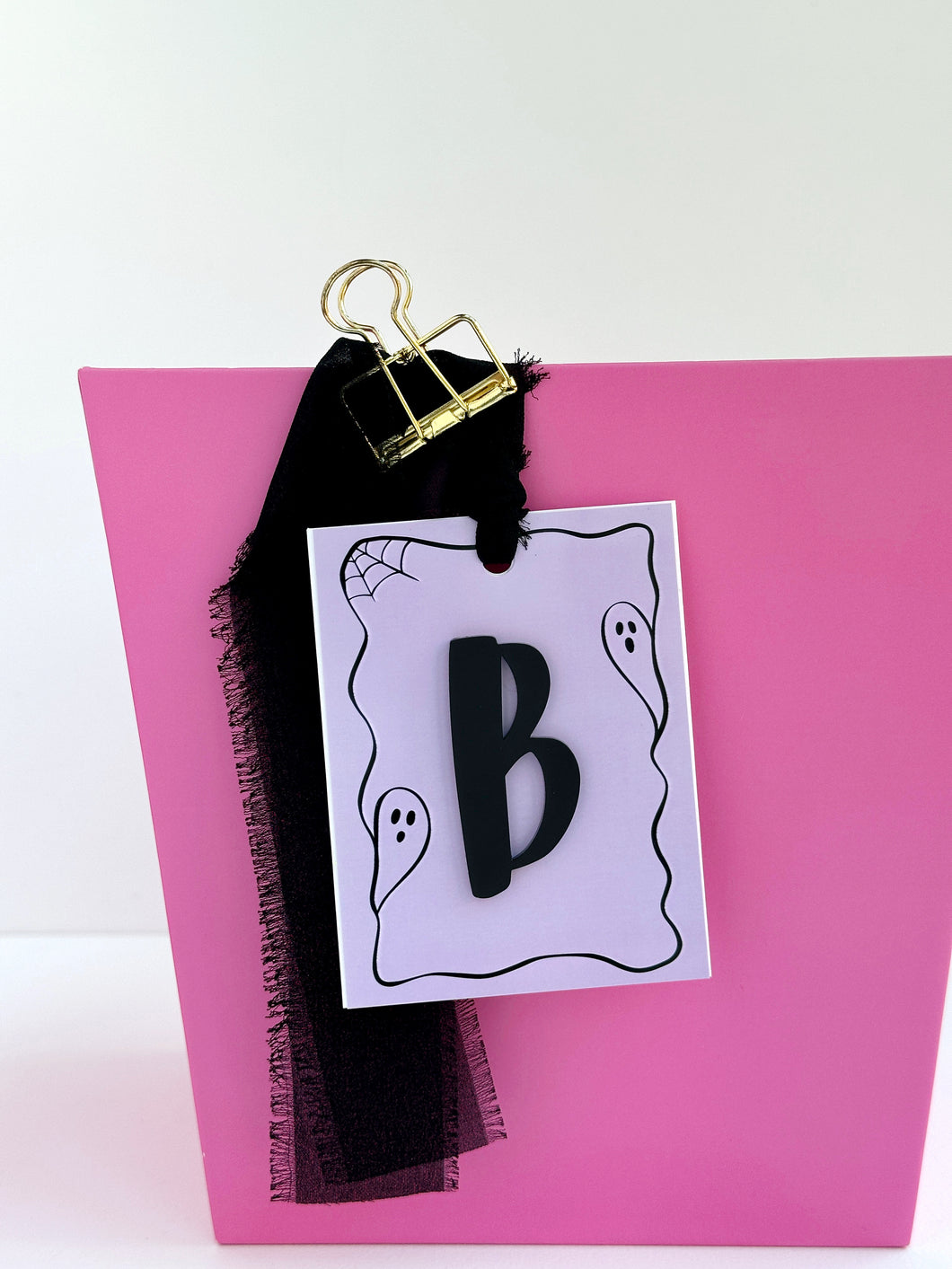 SpOoKtaCuLaR framed initial tag, light purple
